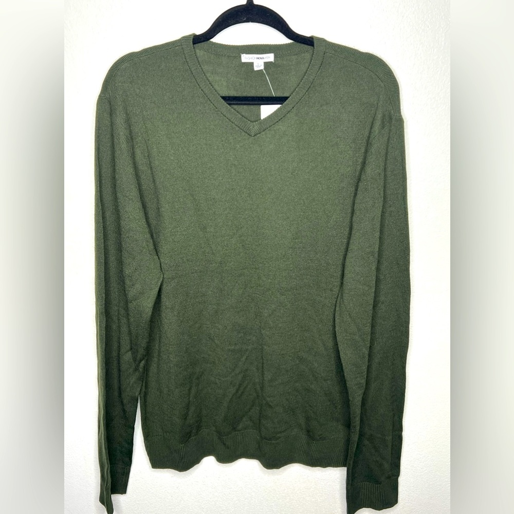 This is a V neck light sweater from FNM Collection